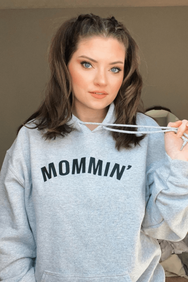 grey hooded sweatshirt with mommin' graphic